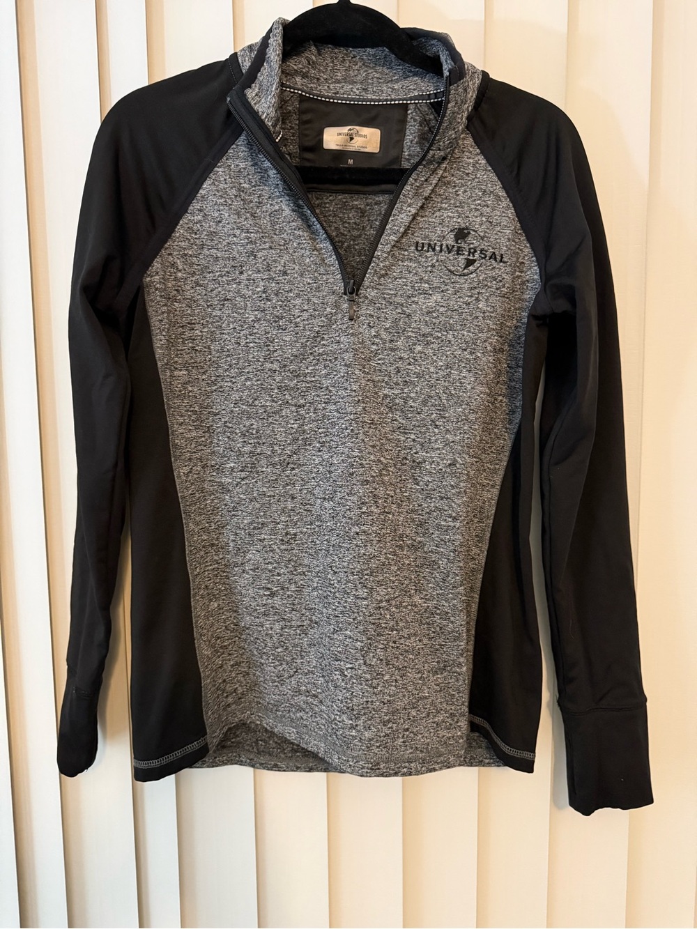 Women’s Universal Studios Black/Gray Quarter Zip Pullover.
